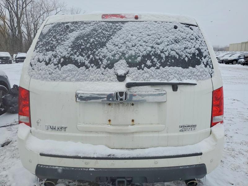 Photo 6 from auction – 2011 HONDA PILOT TOUR with VIN 5FNYF4H96BB038011