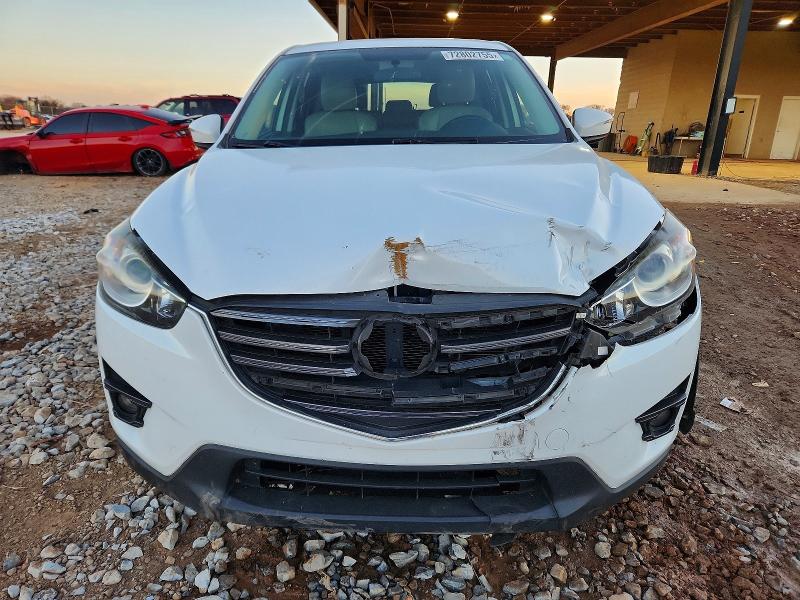 Photo 5 from auction – 2016 MAZDA CX-5 with VIN JM3KE2CY6G0798822