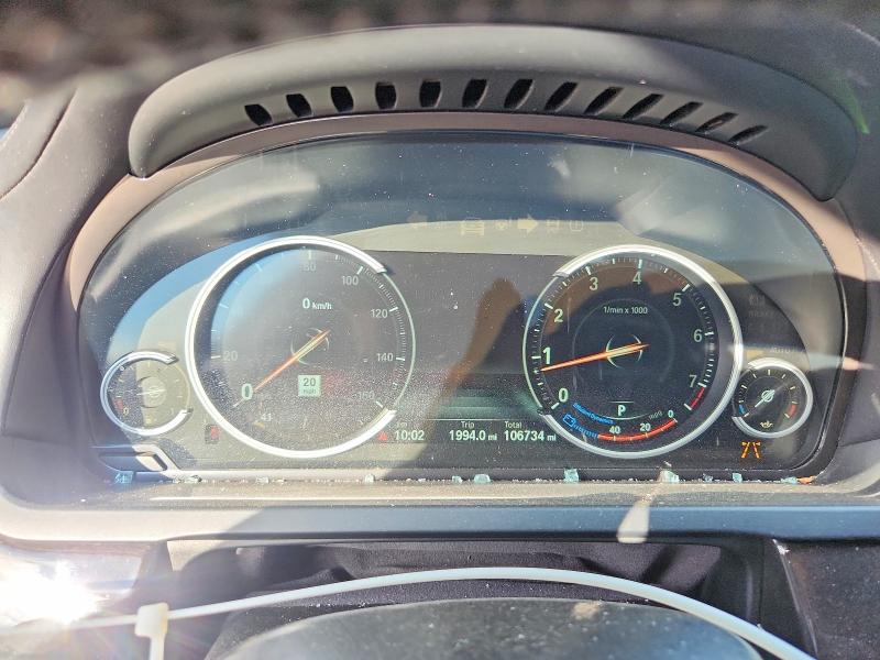 Photo 9 from auction – 2014 BMW 750 with VIN WBAYA8C56ED228233