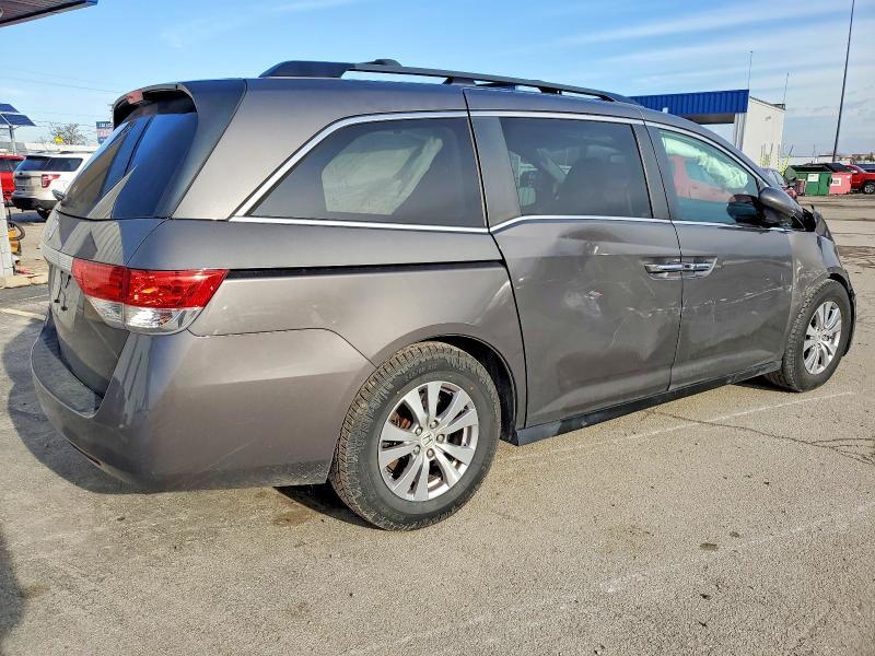 Photo 3 from auction – 2014 HONDA ODYSSEY with VIN 5FNRL5H68EB046043