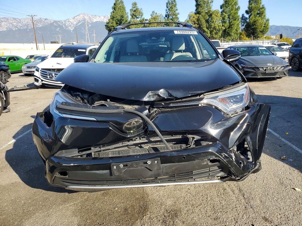 Photo 5 from auction – 2018 TOYOTA RAV4 with VIN 2T3YFREV3JW473687