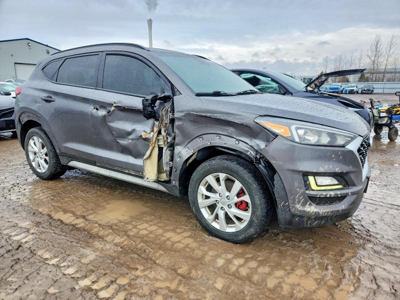 Photo 4 from auction – 2020 HYUNDAI TUCSON LIM with VIN KM8J3CA40LU264875