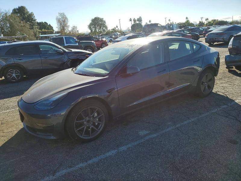 TESLA MODEL 3 2023 with VIN 5YJ3E1EA3PF692742 - Photo from auction