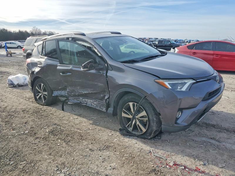Photo 4 from auction – 2018 TOYOTA RAV4 with VIN JTMWFREV8JJ742904