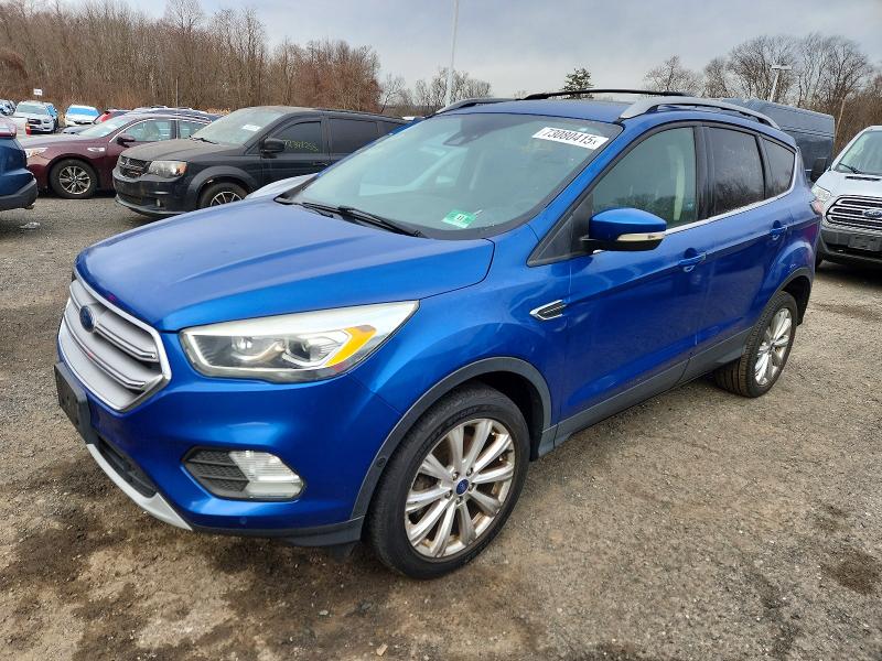 FORD ESCAPE TIT 2017 with VIN 1FMCU9JD1HUA86653 - Photo from auction