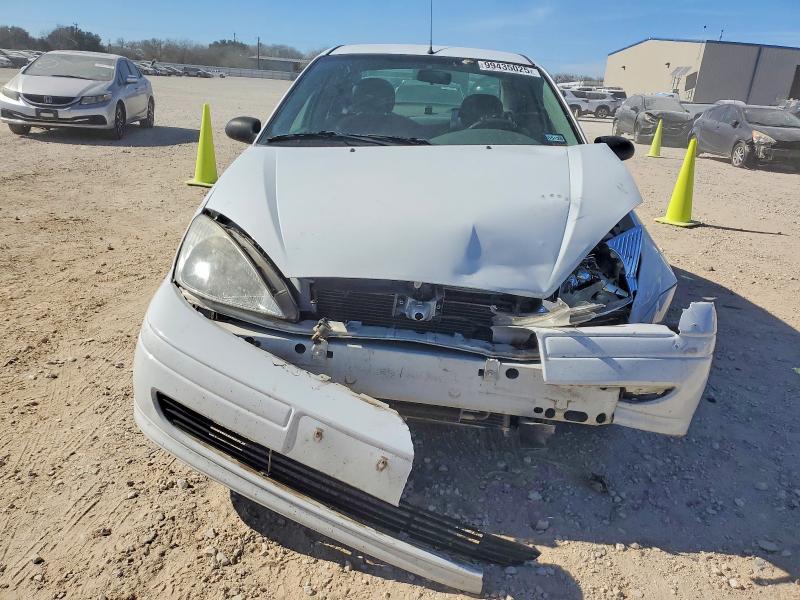 Photo 5 from auction – 2002 FORD FOCUS LX with VIN 1FAFP33P92W322089