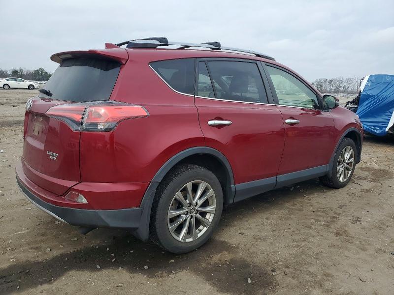 Photo 3 from auction – 2018 TOYOTA RAV4 LIMIT with VIN JTMDFREV1JD243870