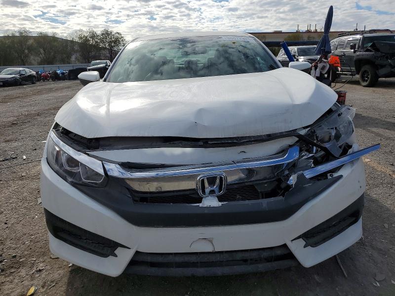 Photo 5 from auction – 2017 HONDA CIVIC LX with VIN 2HGFC2F56HH537349