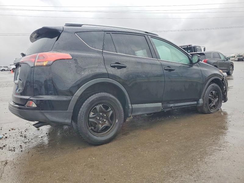 Photo 3 from auction – 2016 TOYOTA RAV4 LE with VIN 2T3ZFREV2GW275857