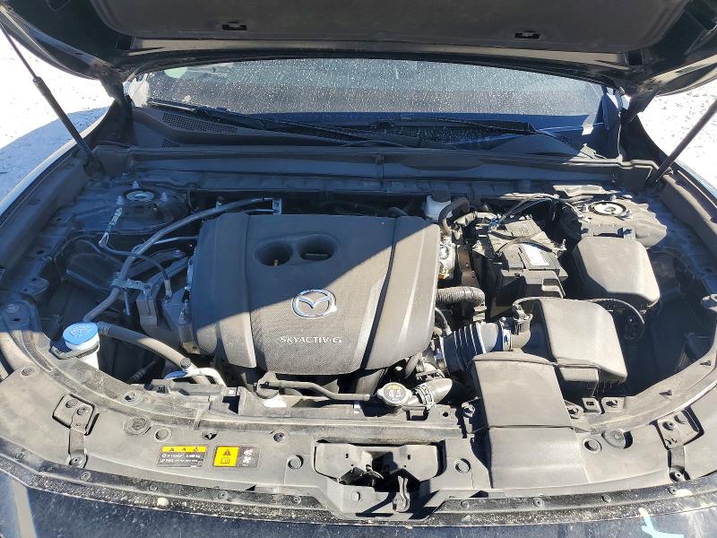 Photo 12 from auction – 2023 MAZDA CX-50 with VIN 7MMVABCM5PN150163