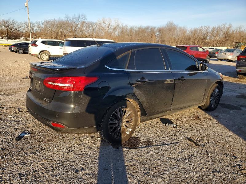 Photo 3 from auction – 2016 FORD FOCUS with VIN 1FADP3J29GL281793
