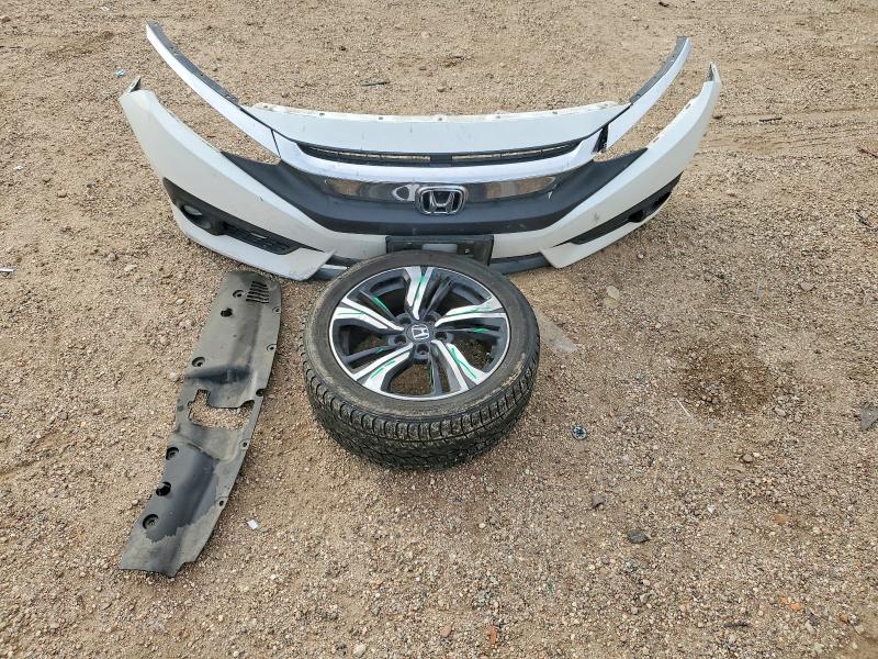 Photo 12 from auction – 2016 HONDA CIVIC with VIN 2HGFC1F92GH657693