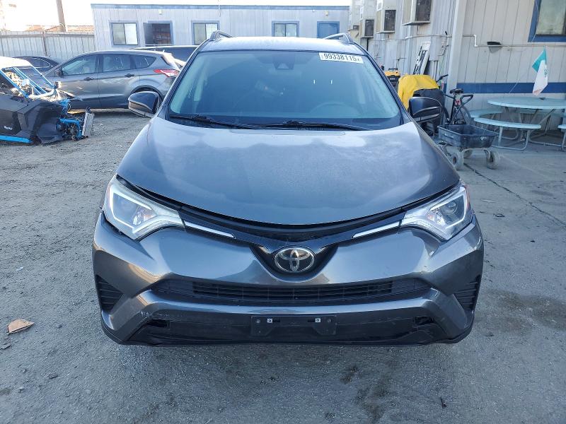Photo 5 from auction – 2018 TOYOTA RAV4 LE with VIN 2T3ZFREV6JW457245