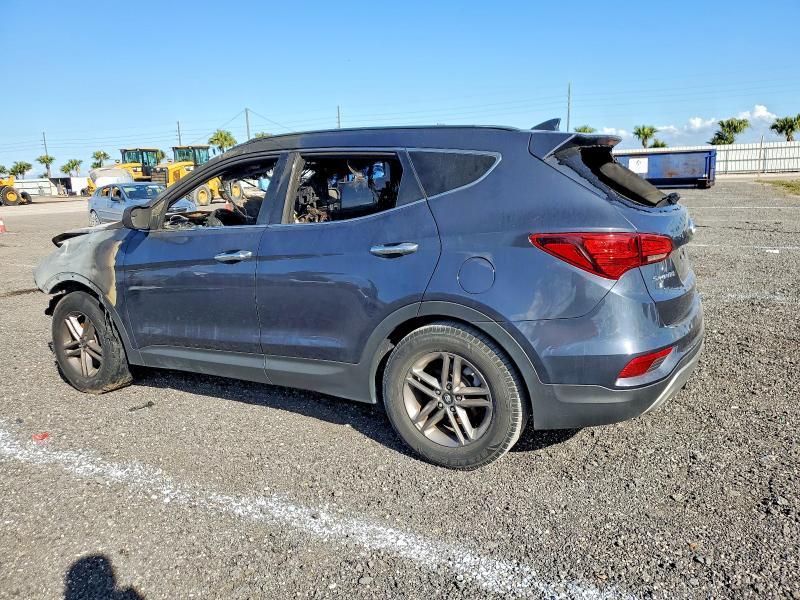 Photo 2 from auction – 2017 HYUNDAI SANTA FE S with VIN 5NMZU3LB4HH006695