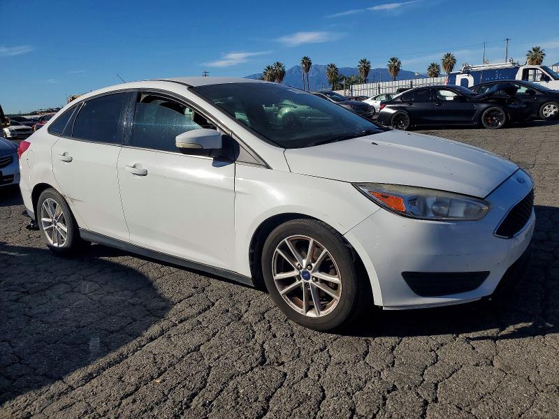 Photo 4 from auction – 2015 FORD FOCUS SE with VIN 1FADP3F25FL221274