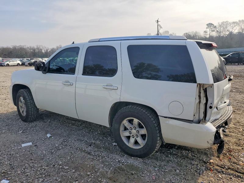 Photo 2 from auction – 2011 GMC YUKON SLE with VIN 1GKS1AE00BR143487