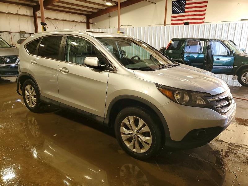 Photo 4 from auction – 2014 HONDA CR-V EXL with VIN 2HKRM4H75EH635052