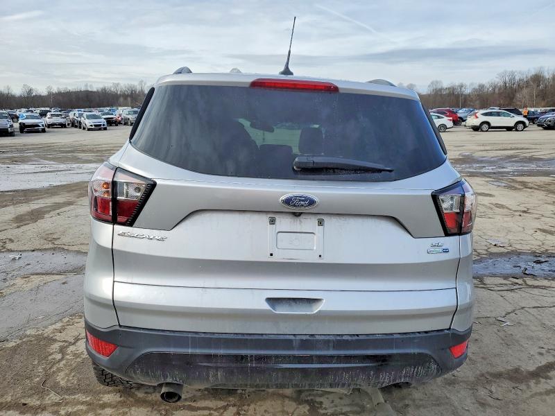Photo 6 from auction – 2018 FORD ESCAPE SE with VIN 1FMCU9GD6JUD42332