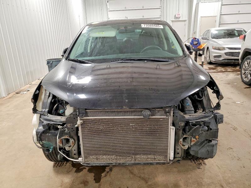 Photo 5 from auction – 2015 HONDA CR-V LX with VIN 2HKRM4H33FH691828