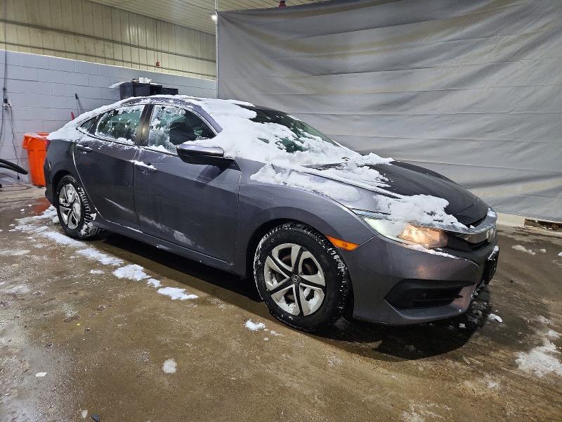 Photo 4 from auction – 2017 HONDA CIVIC LX with VIN 2HGFC2F51HH563888