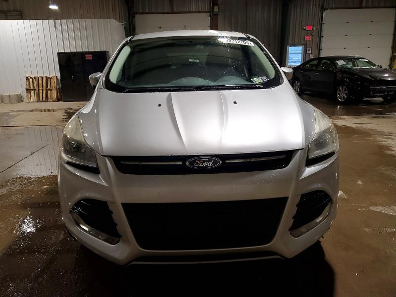Photo 5 from auction – 2016 FORD ESCAPE SE with VIN 1FMCU9GXXGUC82753