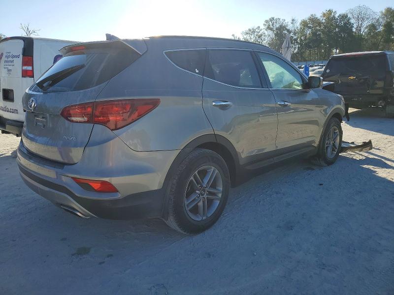 Photo 3 from auction – 2018 HYUNDAI SANTA FE S with VIN 5NMZU3LB8JH077520