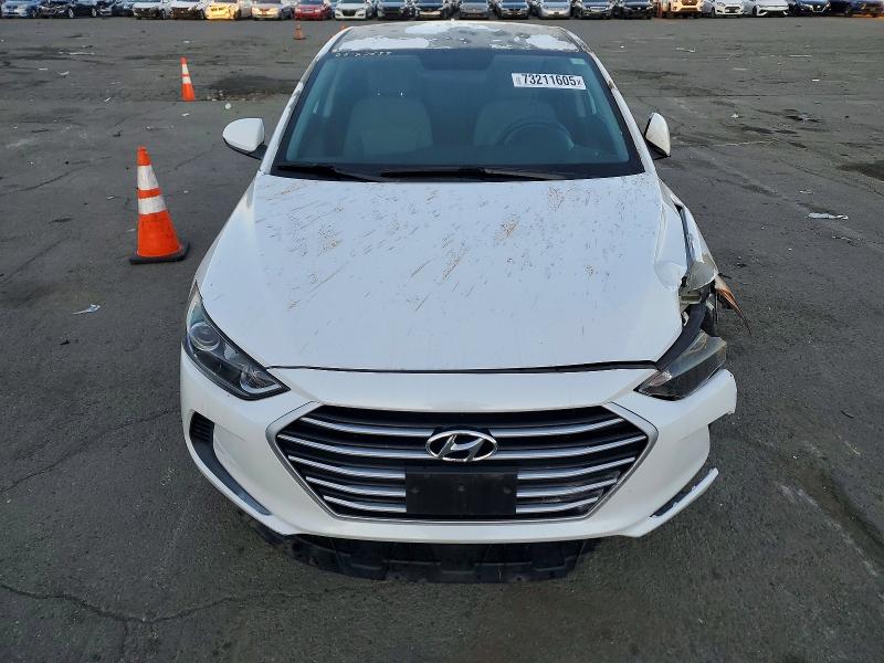 Photo 5 from auction – 2017 HYUNDAI ELANTRA with VIN 5NPD84LF1HH072647