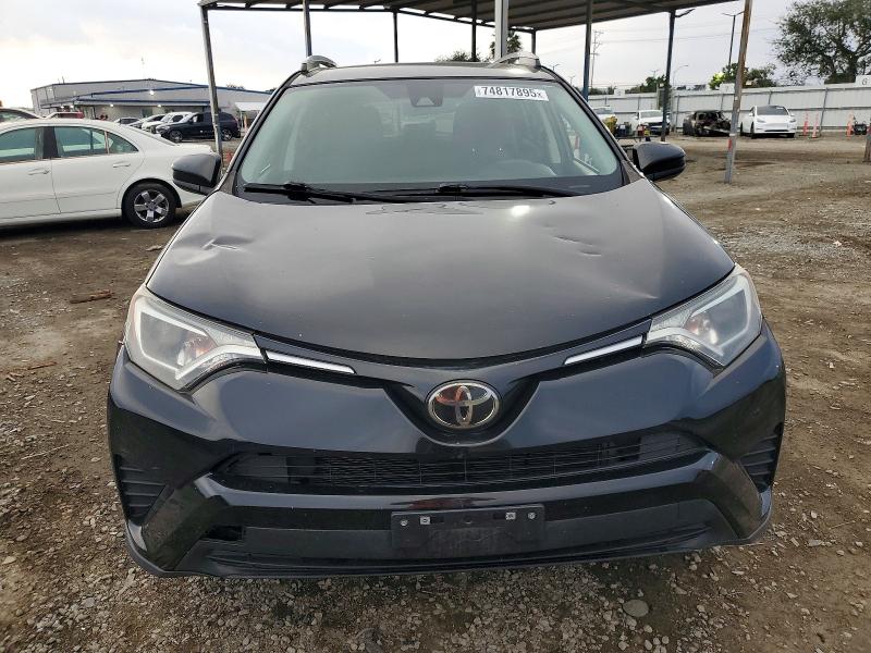 Photo 5 from auction – 2018 TOYOTA RAV4 LE with VIN 2T3ZFREV0JW451098
