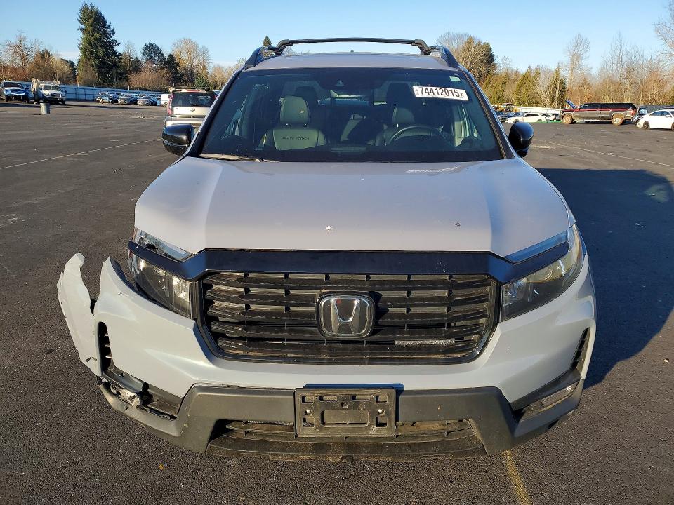 Photo 5 from auction – 2023 HONDA RIDGELINE with VIN 5FPYK3F83PB053936