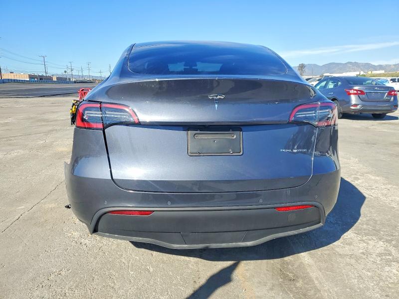 Photo 6 from auction – 2022 TESLA MODEL Y with VIN 7SAYGAEE6NF576535