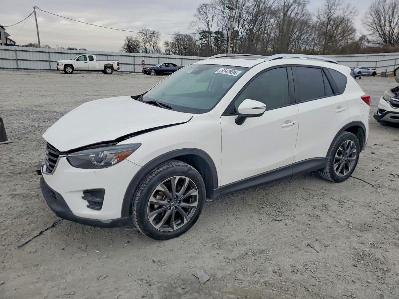 MAZDA CX-5 2016 with VIN JM3KE2DYXG0864416 - Photo from auction