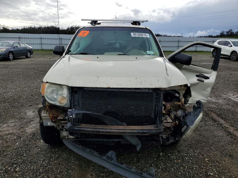 Photo 5 from auction – 2011 FORD ESCAPE with VIN 1FMCU0D77BKA99332