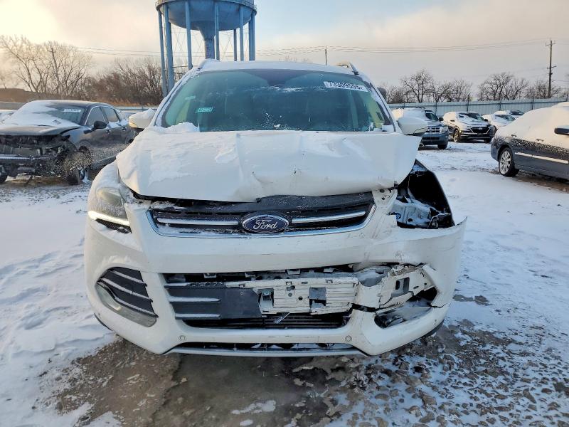 Photo 5 from auction – 2016 FORD ESCAPE TIT with VIN 1FMCU0J99GUC86234