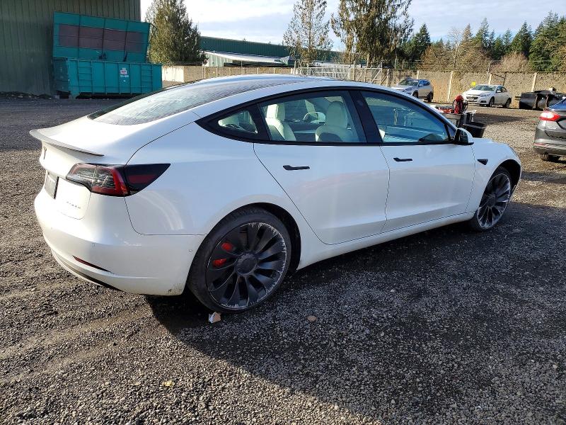 Photo 3 from auction – 2022 TESLA MODEL 3 with VIN 5YJ3E1EC5NF361174