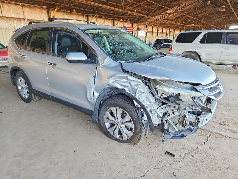 Photo 4 from auction – 2014 HONDA CR-V with VIN 2HKRM3H73EH552990