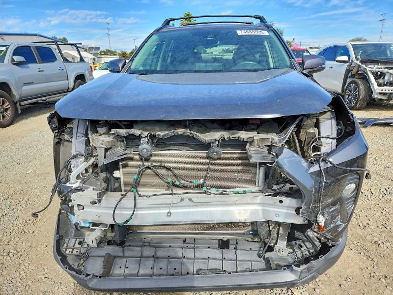 Photo 5 from auction – 2020 TOYOTA RAV4 XLE with VIN JTMP1RFV0LD529447