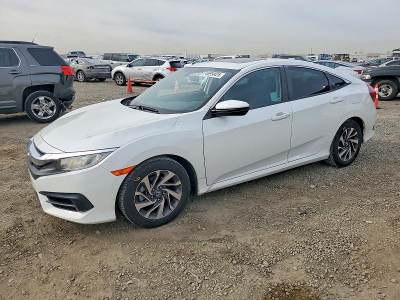 HONDA CIVIC EX 2017 with VIN 2HGFC2F70HH570817 - Photo from auction