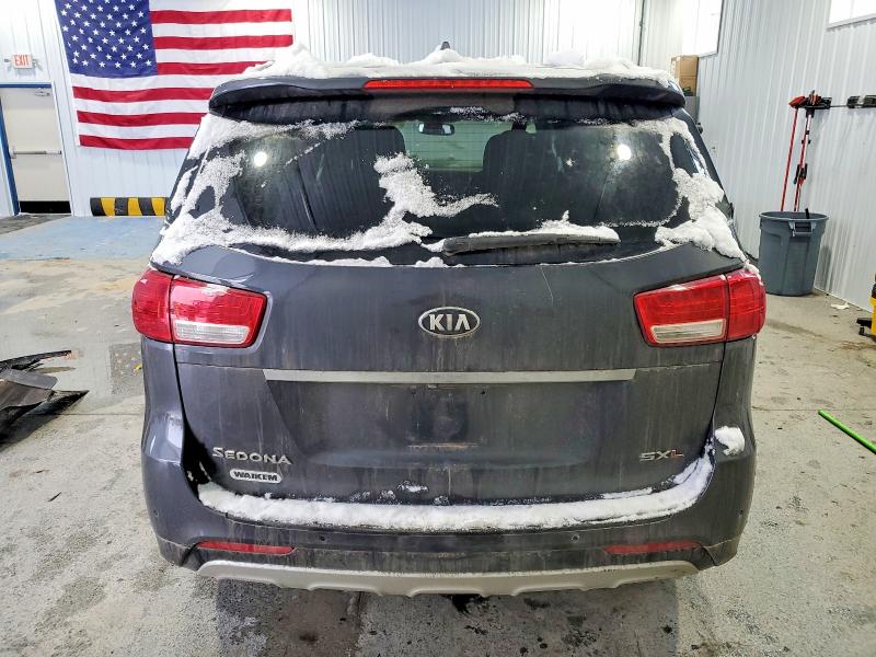 Photo 6 from auction – 2015 KIA SEDONA with VIN KNDME5C13F6037022