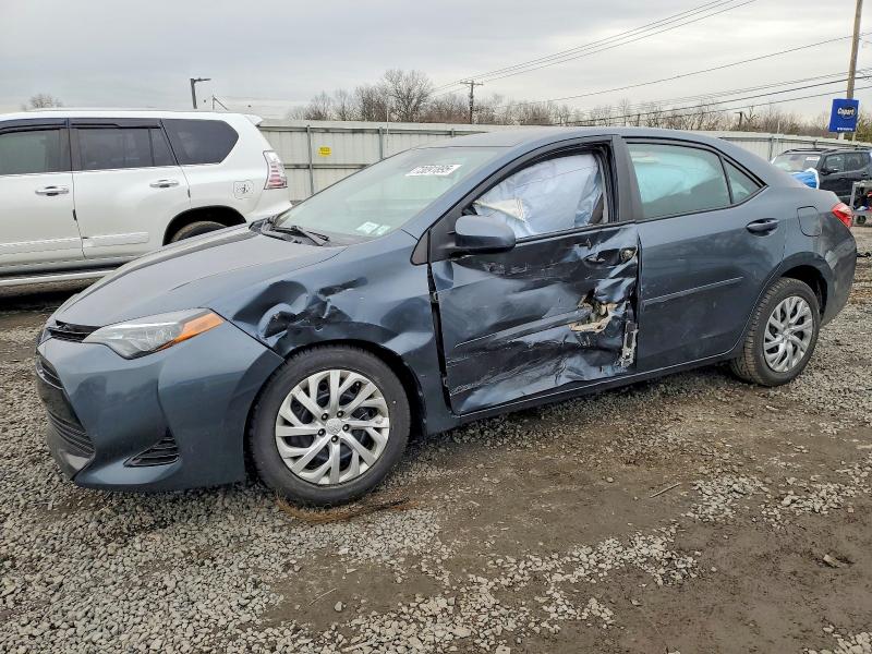 TOYOTA COROLLA L 2018 with VIN 2T1BURHEXJC124561 - Photo from auction