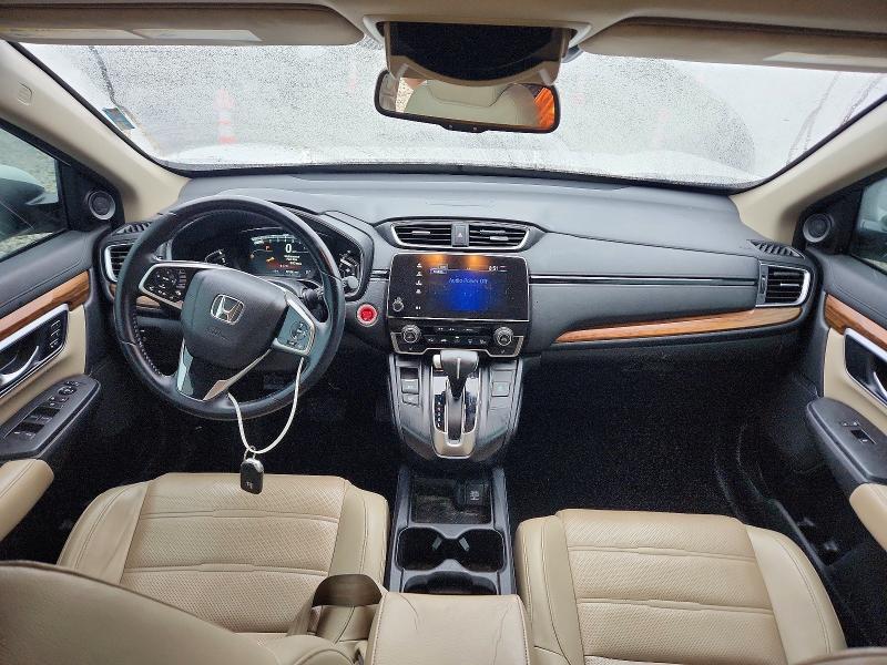 Photo 8 from auction – 2017 HONDA CR-V with VIN 2HKRW1H82HH515683