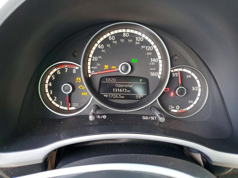 Photo 9 from auction – 2015 VOLKSWAGEN BEETLE R-L with VIN 3VW7T7AT7FM806900