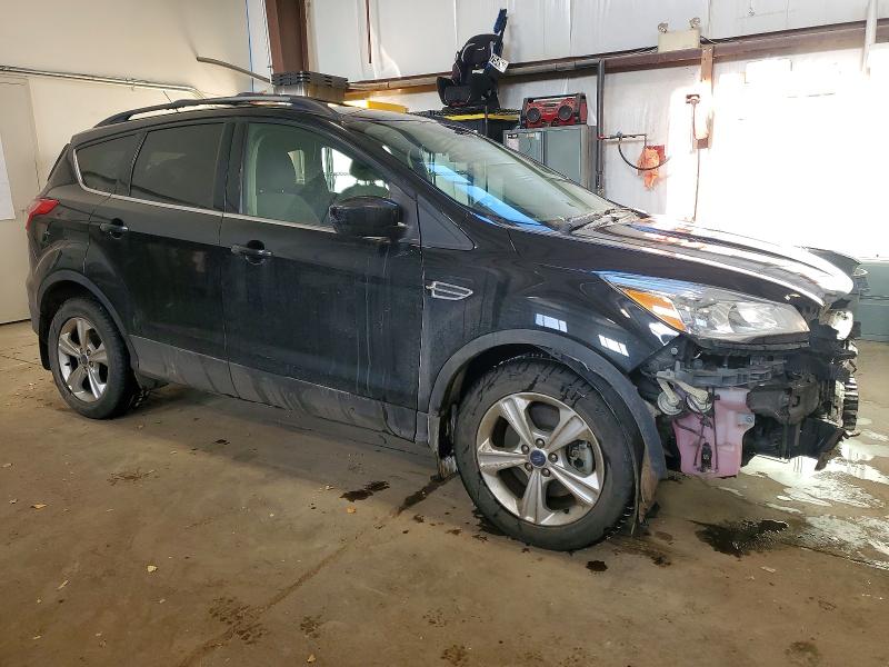 Photo 4 from auction – 2014 FORD ESCAPE SE with VIN 1FMCU9G92EUD68508