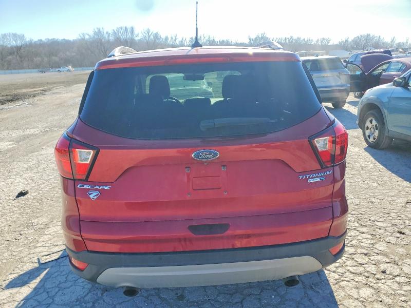 Photo 6 from auction – 2019 FORD ESCAPE with VIN 1FMCU9J92KUC51466