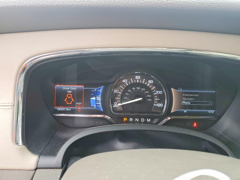 Photo 9 from auction – 2016 LINCOLN NAVIGATOR with VIN 5LMJJ2HT2GEL10457