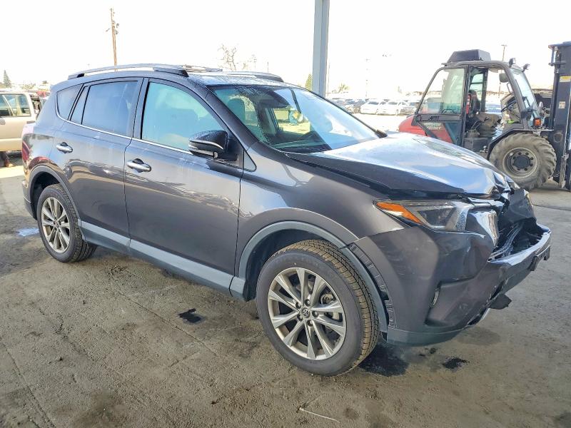 Photo 4 from auction – 2016 TOYOTA RAV4 LIMIT with VIN 2T3YFREV8GW274045
