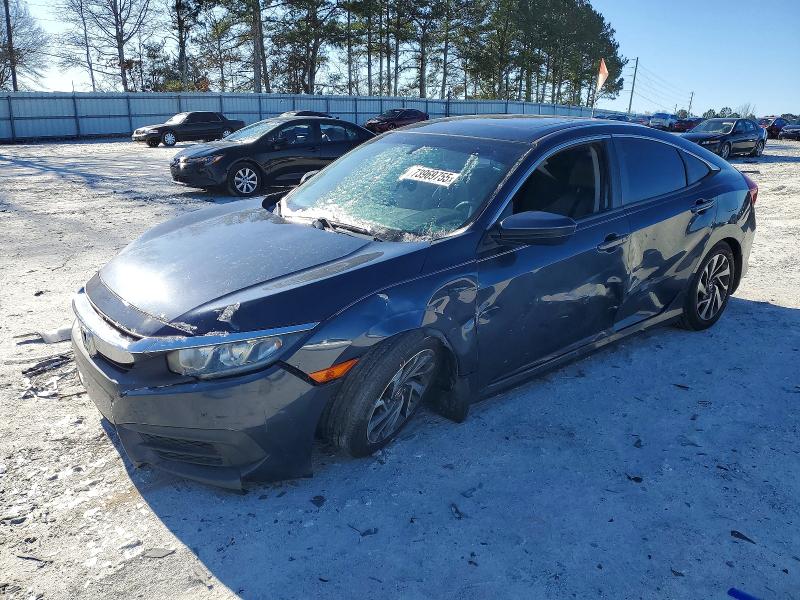 HONDA CIVIC 2018 with VIN 19XFC2F73JE040342 - Photo from auction