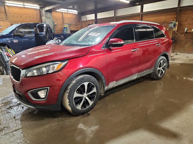 KIA SORENTO EX 2016 with VIN 5XYPHDA59GG004772 - Photo from auction