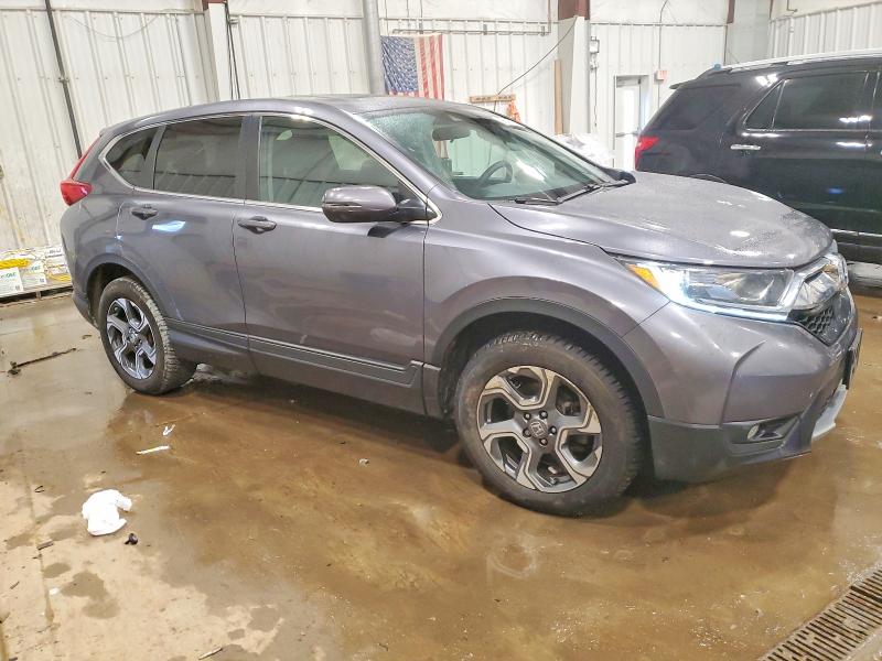 Photo 4 from auction – 2019 HONDA CR-V EX with VIN 5J6RW2H54KL017428