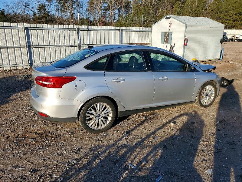 Photo 3 from auction – 2016 FORD FOCUS SE with VIN 1FADP3F27GL298214