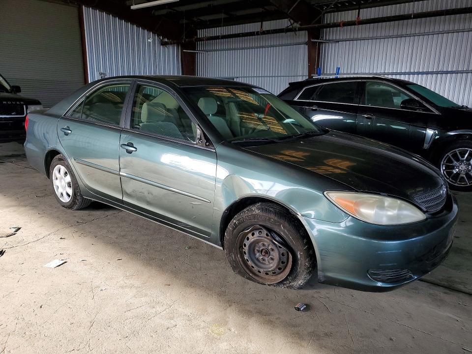 Photo 4 from auction – 2002 TOYOTA CAMRY LE with VIN JTDBE32K620108006